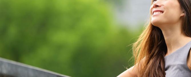 https://images.wisegeek.com/girl-leaning-on-railing.jpg